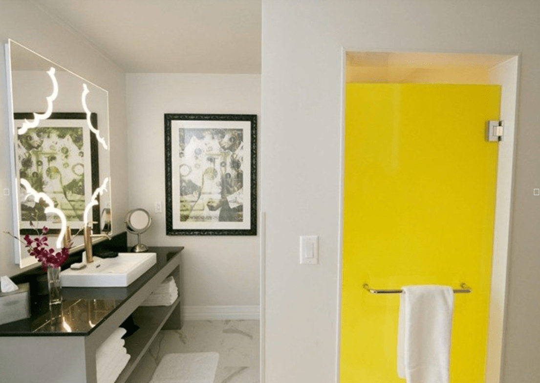 Photo is courtesy of FGD Glass who supplies us with our colored glass. This is a photo of a hotel room with a yellow colored door!